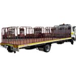 Side profile of MR Class tray truck showing 7.9m long tray and drop sides